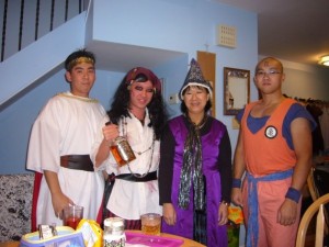 2009:  Jack-sparrow inspired pirate.  Notice my mom's costume.  She made that by hand!  Ricky on the right is also very crafty with a sewing machine